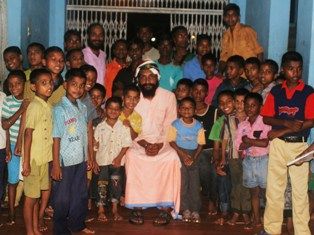 Swami Sukhmeet with children