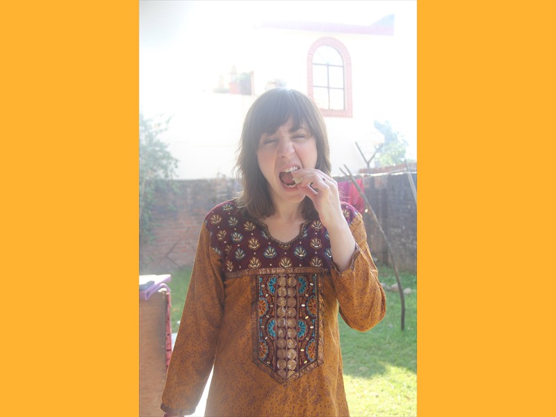 Michelle Kinsey taking a bite